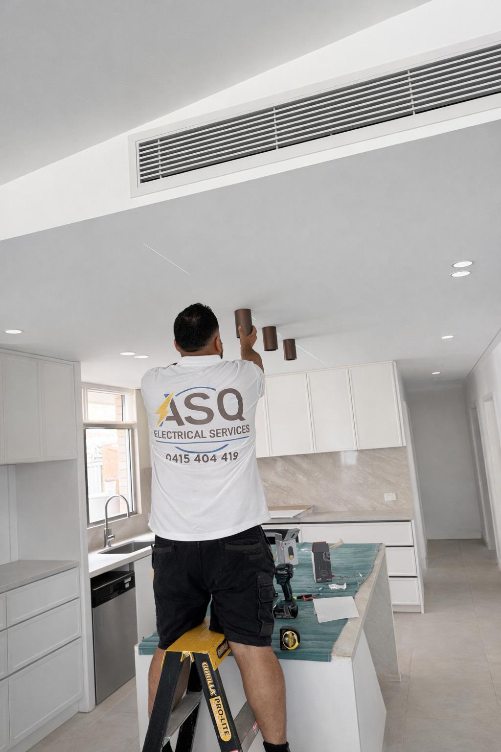 ASQ Electrical Services electrician at work