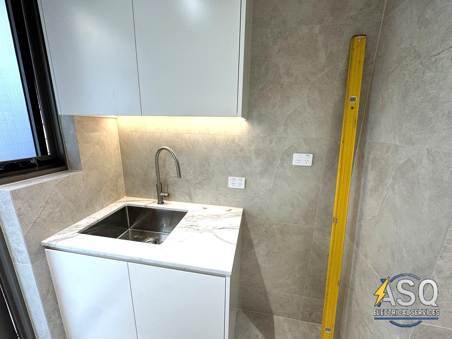 Laundry LED under-cabinet lighting and powerpoints
